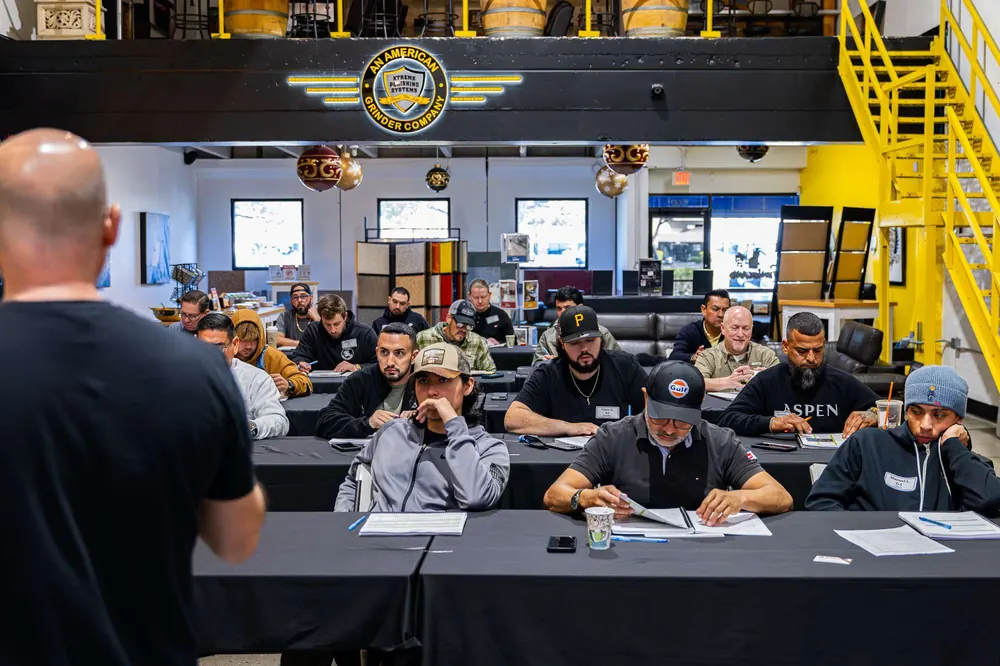 Students take notes during the business and marketing session