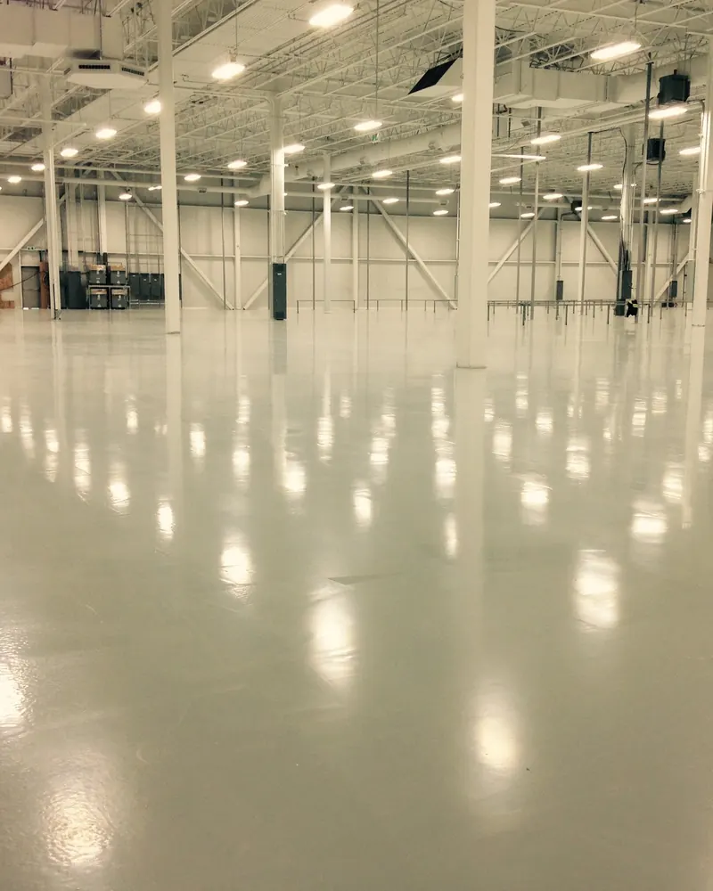 High gloss polyaspartic coated floor in a large warehouse